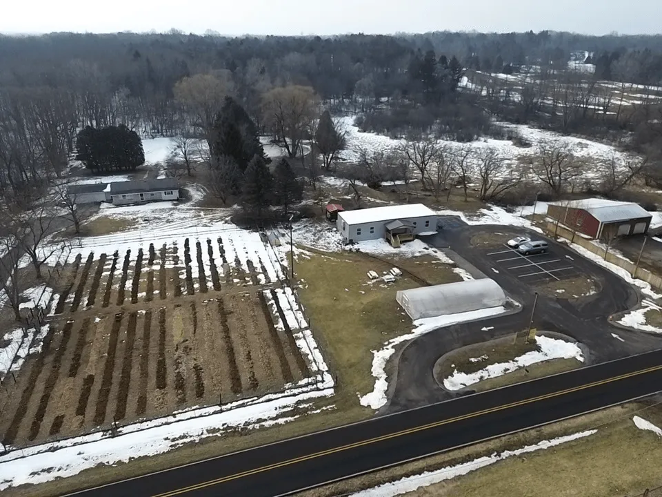 An aerial photo of the school grounds, taken in February 2026 with some snow on the ground.