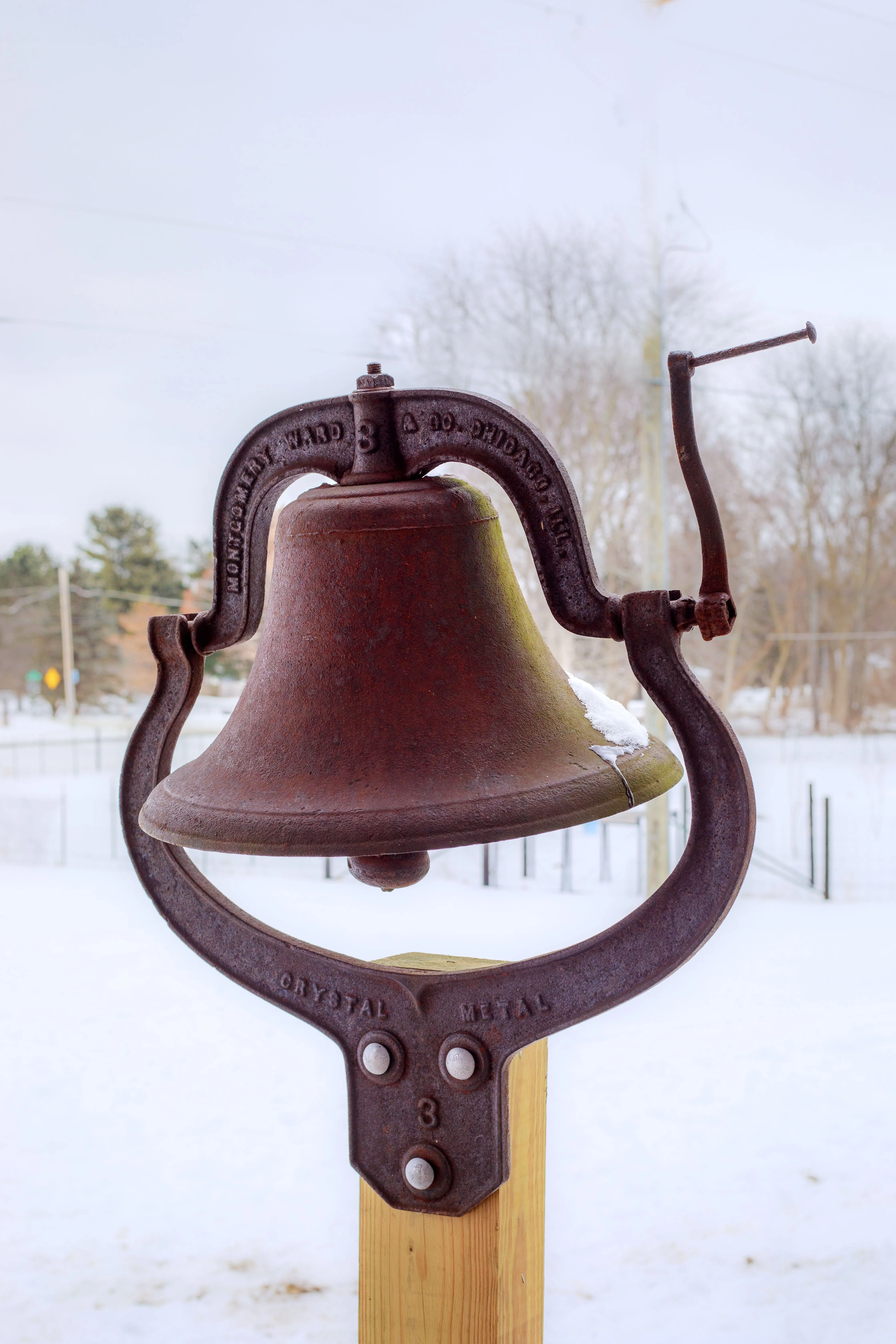 The school's bell used to call students from recess.